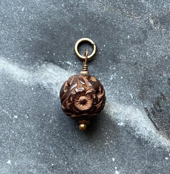 vintage 1930's floral carved wood ball charm