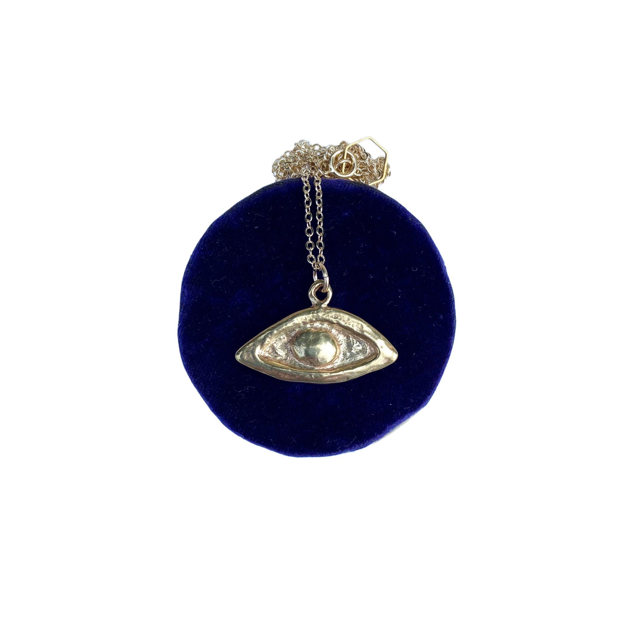 Serpentine cast evil eye charm necklace