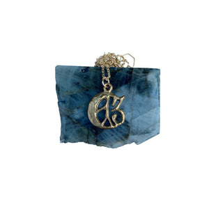 Serpentine cast lucky 13 moon charm necklace