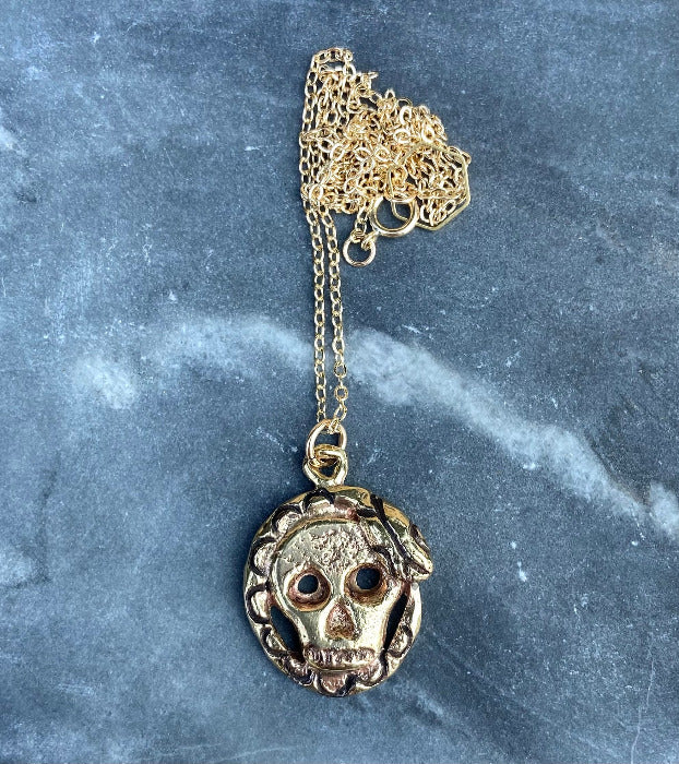 serpentine handmade hand carved lost wax brass cast snake skull charm necklace witchy talisman jewelry
