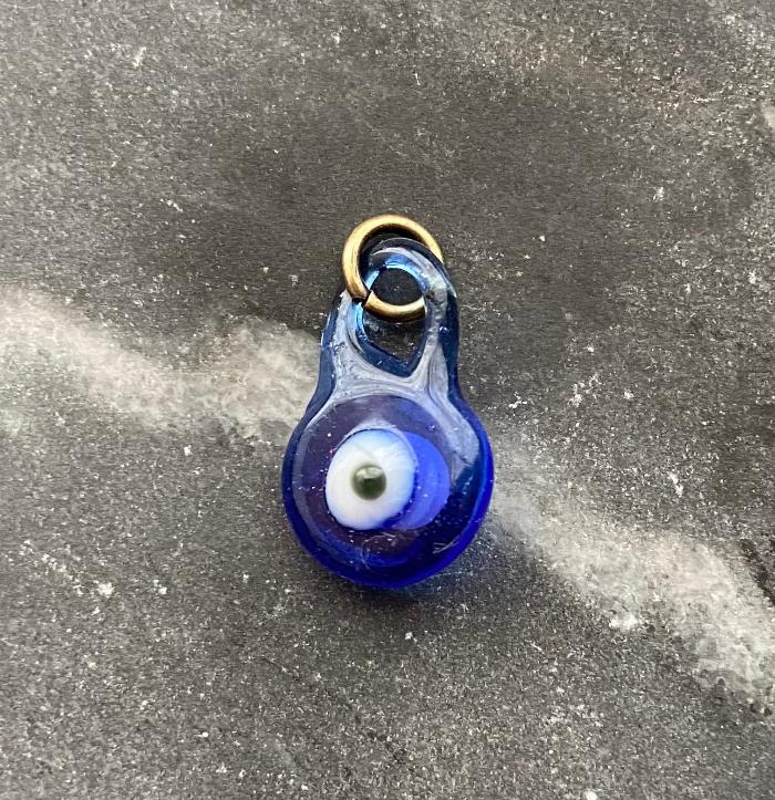 blue glass evil eye charm