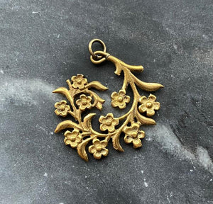 brass curved floral spray charm