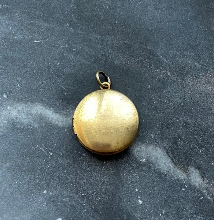 small brass round locket