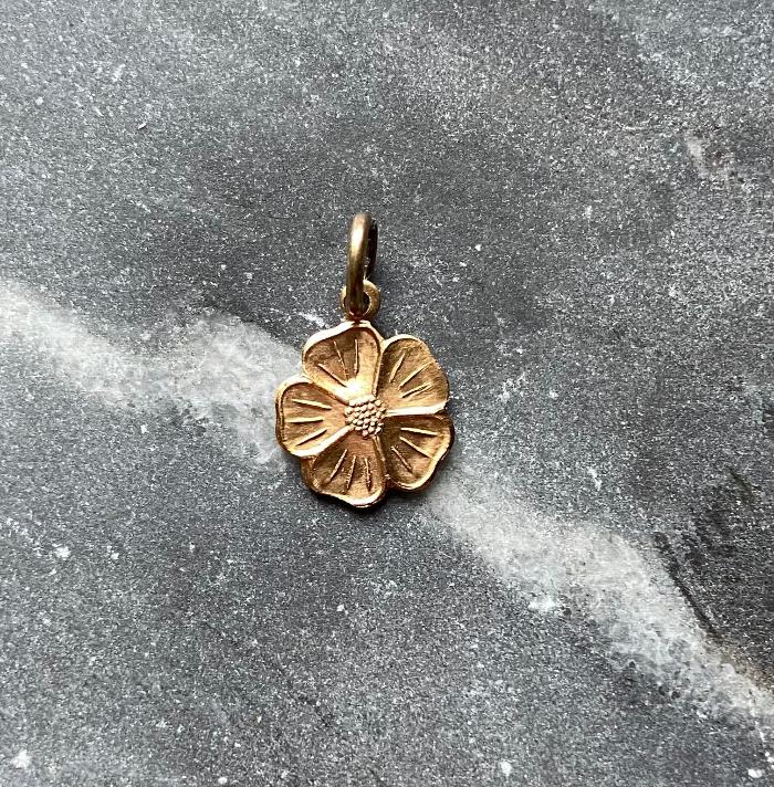 vintage brass flower charm