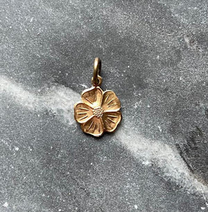 vintage brass flower charm