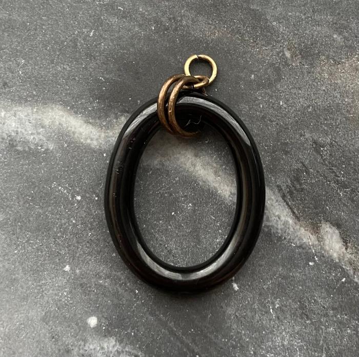 antique victorian black glass oval charm