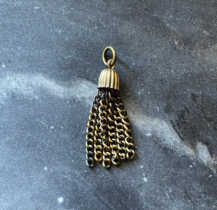 vintage tassel charm