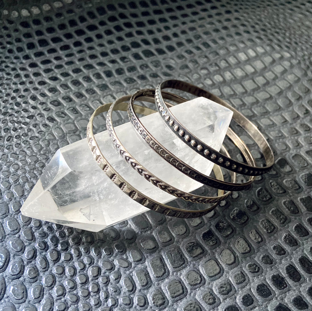 set of four vintage silver bangles stacking bracelets