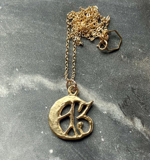 serpentine handmade hand carved lost wax brass cast lucky 13 crescent moon charm necklace witchy talisman jewelry