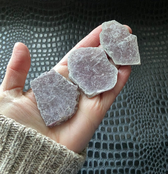 Small rough lepidolite crystal slice