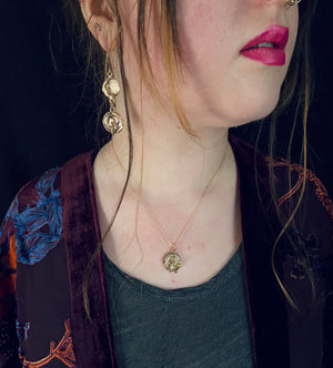serpentine wax cast brass jewelry celestial moon snake earrings