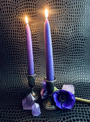 amethyst crystal point with vintage candlesticks.