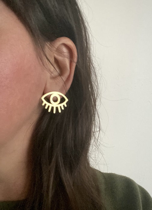 Large brass eye stud earrings