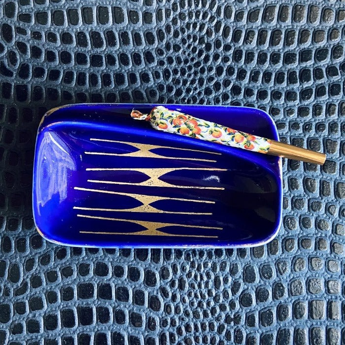 antique blue and gold ceramic ashtray.