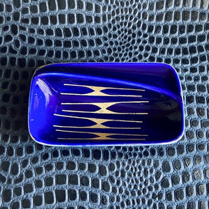 antique blue and gold ceramic ashtray.